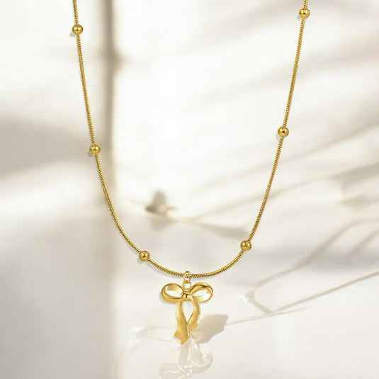 Gold Plated Anti Tarnish Stainless Steel Bow Themed Pendant