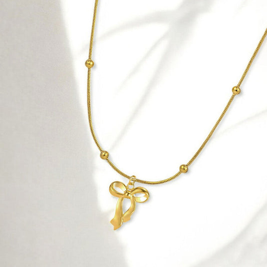 Gold Plated Anti Tarnish Stainless Steel Bow Themed Pendant