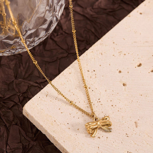 Gold Plated Stainless Steel Anti Tarnish Bow Themed Pendant